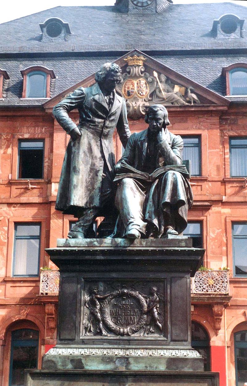 Monument to brothers Grimm on the market place in Hanau. (Hessen, Germany)